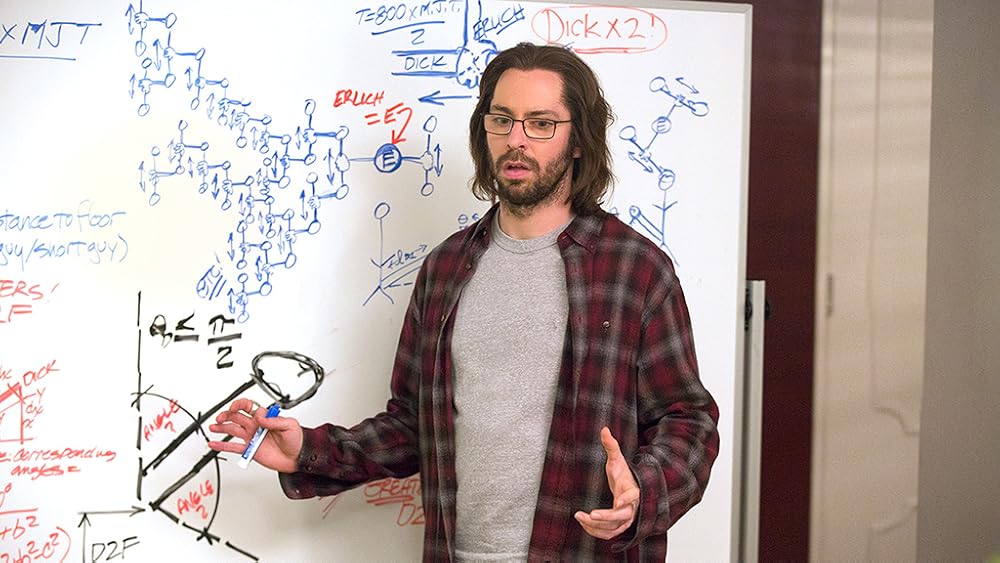 A whiteboard covered with a compression diagram